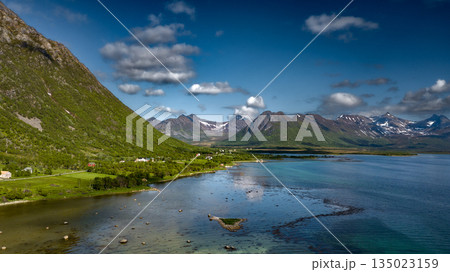 Coastal Landscape In Aerial View With Fjord And Snowy Mountains On Lofoten Islands In Norway Coastal Landscape In Aerial View With Fjord And Snowy Mountains On Lofoten Islands In Norway 135023159
