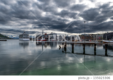 Tromso Harbor With Cruise Ship And Modern Buildings In Calm Fjord In Norway 135023306