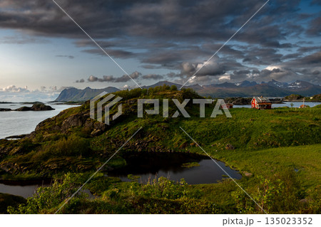 Coastal Landscape With Old Nickel Mine And Red Cottage On Senja Island At Vesteralen In Norway Coastal Landscape With Old Nickel Mine And Red Cottage On Senja Island At Vesteralen In Norway 135023352