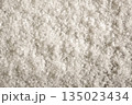 White natural salt as background, closeup view 135023434