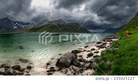 Small Red Hut On White Sand Beach On Lofoten Islands In Norway Small Red Hut On White Sand Beach On Lofoten Islands In Norway 135025127