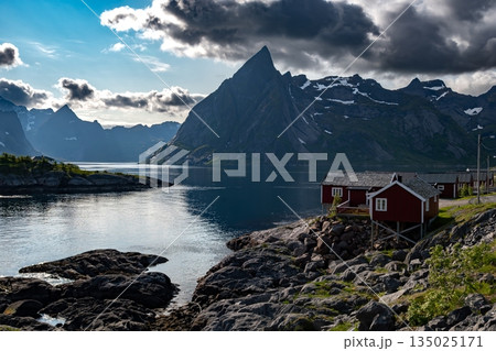 Picturesque Coastal Village Hamnoy With Red Rorbuer Huts On Lofoten Islands In Norway 135025171