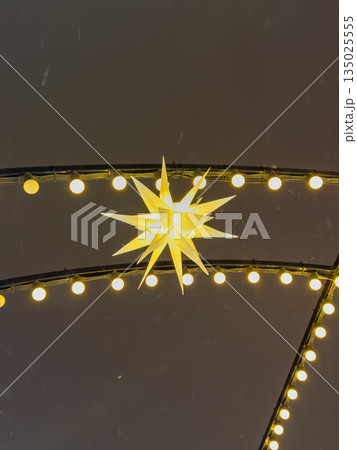Vibrant evening market illuminated with bright decorations and pine scent 135025555