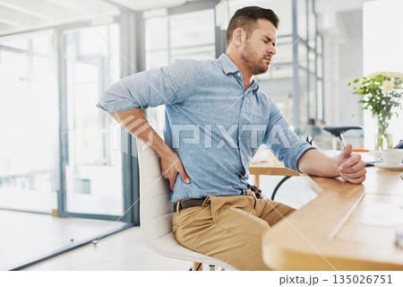 Business man, back pain and stress in office with burnout, fatigue or muscle injury at desk. Businessman, tired body and rub with ache, frustrated or problem with accident, emergency and osteoporosis Business man, back pain and stress in office with burnout, fatigue or muscle injury at desk. Businessman, tired body and rub with ache, frustrated or problem with accident, emergency and osteoporosis 135026751
