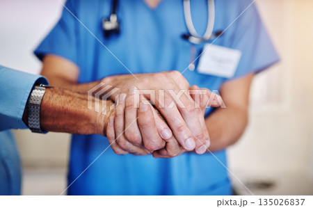 Care, support and a doctor holding hands with a man for healthcare, help and service. Caregiver, love and closeup of a nurse with a helping hand for a senior person for medical trust and nursing Care, support and a doctor holding hands with a man for healthcare, help and service. Caregiver, love and closeup of a nurse with a helping hand for a senior person for medical trust and nursing 135026837