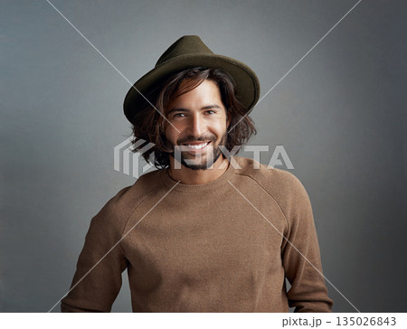 Portrait, hat and smile of man in studio isolated on a gray background. Face, fedora and handsome male person or model from Australia with happiness for fashion, stylish and trendy aesthetic mockup. 135026843