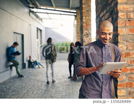 Smile, outdoor and man with a digital tablet, campus and search website for information, connection and meme. Male person, guy and student with technology, typing and social media with communication Smile, outdoor and man with a digital tablet, campus and search website for information, connection and meme. Male person, guy and student with technology, typing and social media with communication 135026999