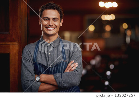 Portrait, man and small business owner of cafe, restaurant or pub with a smile for career pride. Male entrepreneur person as manager, barista and waiter or bartender at door for shop welcome greeting Portrait, man and small business owner of cafe, restaurant or pub with a smile for career pride. Male entrepreneur person as manager, barista and waiter or bartender at door for shop welcome greeting 135027257