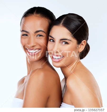 Women friends, studio portrait and cosmetics with smile, beauty and wellness by white background. Lesbian woman, skincare and happy together with excited face, natural glow and isolated for makeup 135027337