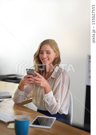 Phone, happy and business woman in office texting, reading and checking app for message on wall background. Smartphone, communication and female person online for meme, social media or chatting Phone, happy and business woman in office texting, reading and checking app for message on wall background. Smartphone, communication and female person online for meme, social media or chatting 135027555