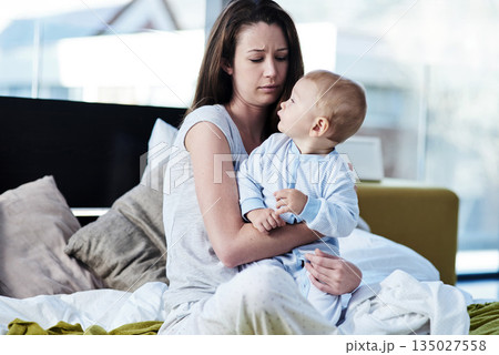 Mother, baby and depression in the bedroom is sad and need help with mental health and raise children. Newborn, parent and postpartum is frustrated in bed with anxiety and stress in family home. Mother, baby and depression in the bedroom is sad and need help with mental health and raise children. Newborn, parent and postpartum is frustrated in bed with anxiety and stress in family home. 135027558