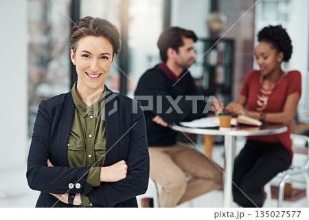 Portrait, business woman and happy with arms crossed in office workplace. Face, confidence and female professional, entrepreneur or person with a smile, pride for career and leadership in company. 135027577
