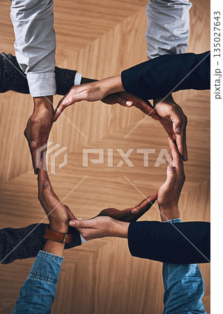 Synergy, motivation or hands of business people in circle for sustainability, support or recycling in above office. Teamwork, recycle or employees for sustainable, community help or partnership group Synergy, motivation or hands of business people in circle for sustainability, support or recycling in above office. Teamwork, recycle or employees for sustainable, community help or partnership group 135027643