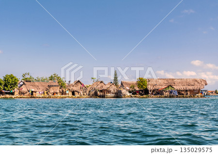 Guna people huts on San Blas Island at politically autonomous Guna territory in Panama. 135029575