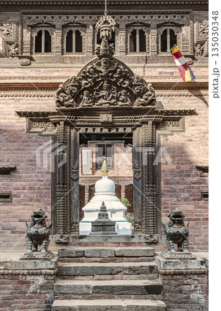 Ancient doors opening to Royal Palace in Bahtapur, Nepal 135030348
