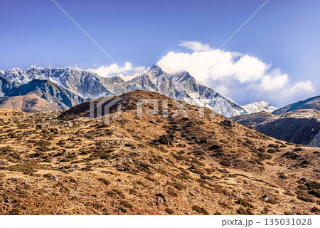 Himalayan mountains landscape on the trail between Pheriche and Namche Bazaar in Nepal. Himalayan mountains landscape on the trail between Pheriche and Namche Bazaar in Nepal. 135031028