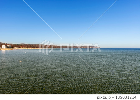 Baltic seaside with beaches as viewed from the pier in Sopot, Poland. 135031214
