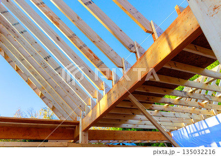 Wooden truss are being assembled for beams joists roof n construction site Wooden truss are being assembled for beams joists roof n construction site 135032216