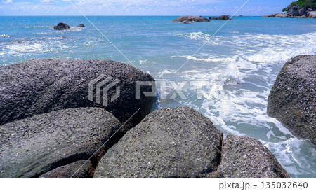Large Granite Rocks on Tropical Beach with Blue Sea Water in Sungailiat Bangka 135032640