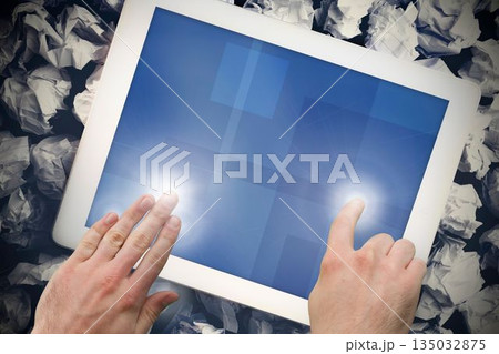 Hands touching tablet screen Hands touching tablet screen 135032875