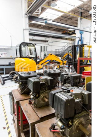 Yellow excavator is standing in flat design workshop scene showing wooden benches and engines Yellow excavator is standing in flat design workshop scene showing wooden benches and engines 135033085