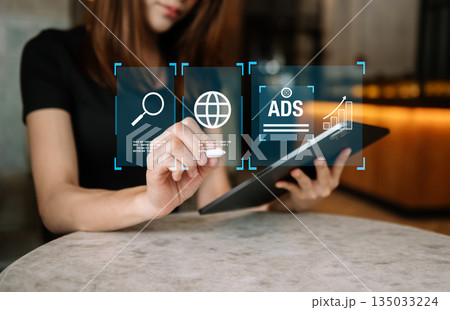 Digital marketing commerce online sale concept, woman using tablet, laptop with Ads and sales. Digital marketing commerce online sale concept, woman using tablet, laptop with Ads and sales. 135033224