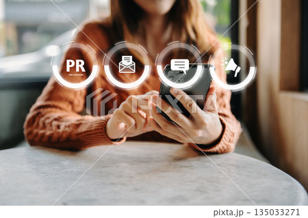 PR, Public relations concept. hands using laptop and tablet with public relations icon for communication advertising marketing strategy 135033271