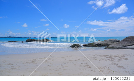 Peaceful Horizon View from Sungailiat Beach with Granite Rocks and Waves 135035225