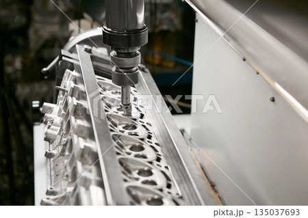 Engine valve car maintenance.The cylinder block of the six-cylinder engine. Disassembled motor vehicle for repair. Engine valve car maintenance.The cylinder block of the six-cylinder engine. Disassembled motor vehicle for repair. 135037693