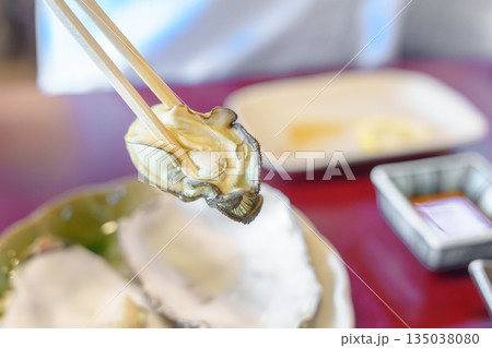 grilled Oyster in Matsushima fish market, seafood famous and popular of Matsushima bay in Miyagi Prefecture, Tohoku, Japan grilled Oyster in Matsushima fish market, seafood famous and popular of Matsushima bay in Miyagi Prefecture, Tohoku, Japan 135038080