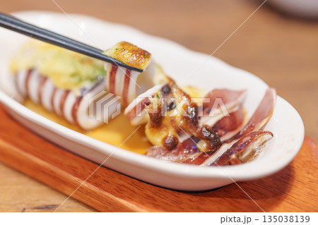 Grilled Squid with Cheese Sauce on plate 135038139