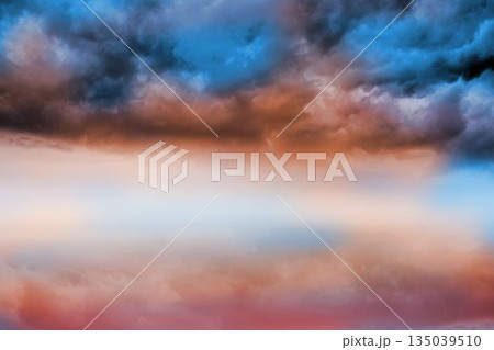 Blue orange cloudy sky background Blue orange cloudy sky background 135039510