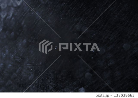 Rain-soaked glass pane is showing water droplets and streaks in flat design, with bokeh reflections 135039663