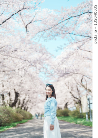 Woman tourist sightseeing Kitakami Tenshochi Park with Sakura Cherry Blossom in Spring, traveler travel in Kitakami festival, Iwate prefecture, Japan. Landmark for Travel and Vacation destination Woman tourist sightseeing Kitakami Tenshochi Park with Sakura Cherry Blossom in Spring, traveler travel in Kitakami festival, Iwate prefecture, Japan. Landmark for Travel and Vacation destination 135040035
