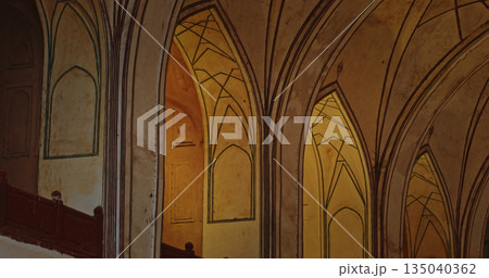 Red Fort corridor with illuminated Mughal arches and warm yellow light at night in Delhi Red Fort corridor with illuminated Mughal arches and warm yellow light at night in Delhi 135040362