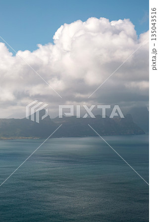 Scenic view of Cape of Good Hope, South Africa. Cloudy sky, vast ocean water Scenic view of Cape of Good Hope, South Africa. Cloudy sky, vast ocean water 135043516