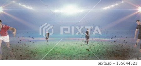 Flat design showing rugby players lunging over muddy turf in cleats under goalposts and floodlights 135044323