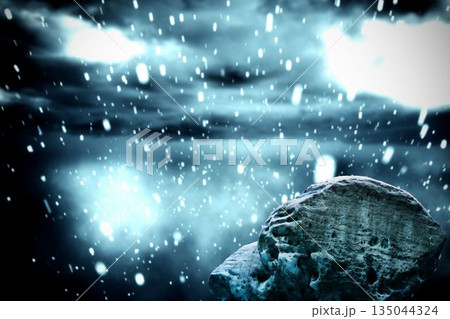 Large rock overlooking snowy sky Large rock overlooking snowy sky 135044324