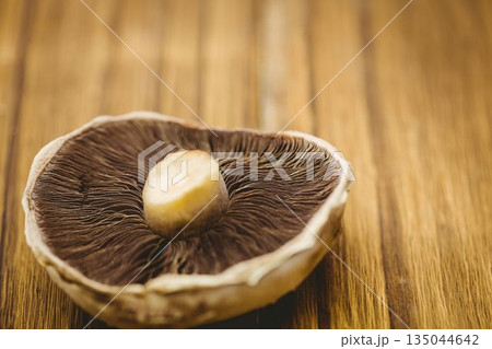 Fresh mushroom on wooden table 135044642