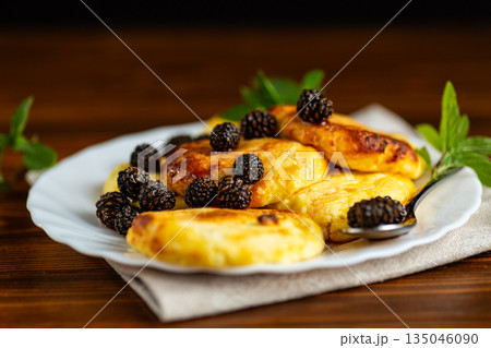Delicious breakfast pancakes with forest pine cone jam 135046090