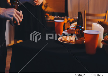 Friends enjoying a Halloween party at a bar making a toast 135046178