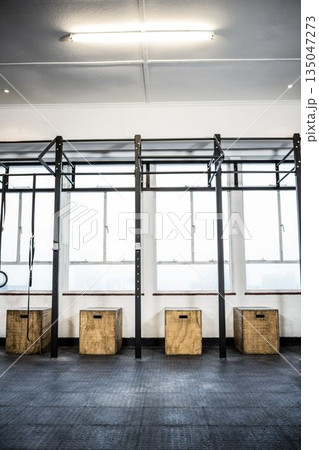 Gymnastics rings by boxes 135047273