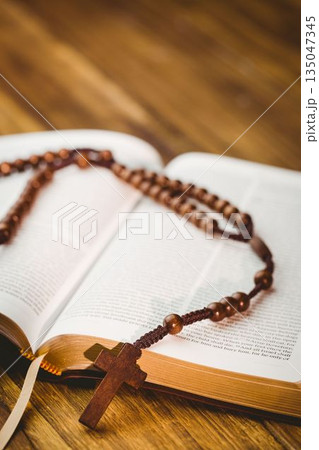 Rosary beds on bible book 135047345