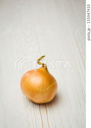 Fresh onion on wooden table Fresh onion on wooden table 135047410