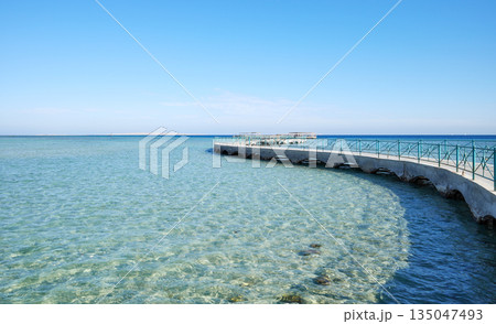 Concrete pier at the beach in Hurghada, Egypt. 135047493