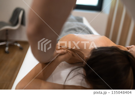 Close up picture of a woman having massage session 135048404