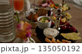Assorted healthy breakfast with fresh fruits, yogurt, and juice. Features pineapple, tangerine, and apple slices alongside other delicious ingredients. Ideal for nutritious and balanced diet concepts. 135050192