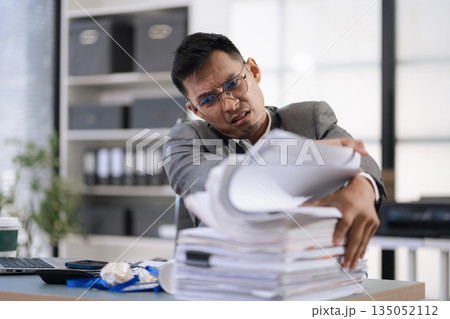 Stressed businessman facing unemployment and business failure in office. Stressed businessman facing unemployment and business failure in office. 135052112