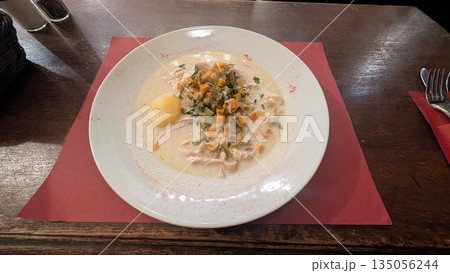Belgian traditional milk soup with chicken and vegetable 135056244