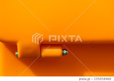 orange plastic box part with fastener screw 135058460